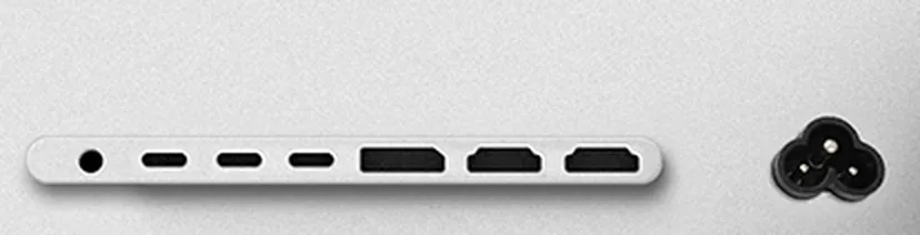 Close-up of the row of connectors on the back of the Kuycon W34KB: a headphone jack, three USB-C ports, a DisplayPort, two HDMI ports, then the power socket