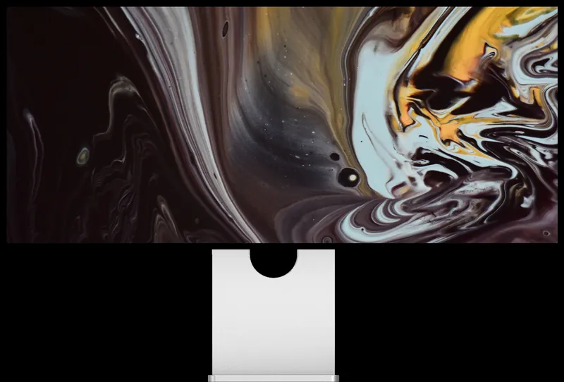 Kuycon W34KB monitor on a black background showing a dark marbled pattern in black, gray and gold, to illustrate contrast